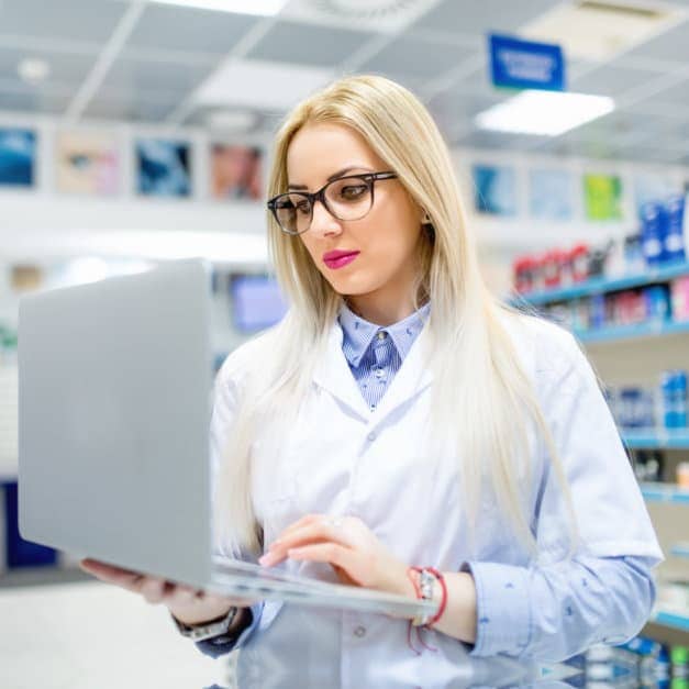 pharmacist with laptop